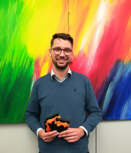 Beaming with pride: contest winner Christian, Product Owner SRM