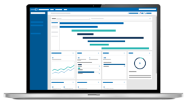 A laptop displaying a dashboard with graphs, charts, and data visualizations on a blue and white interface.